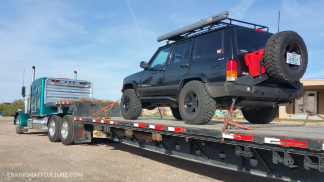 The PDXJ on a flatbed trailer