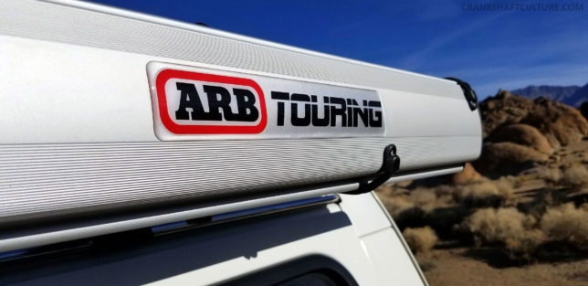 Oversized ARB Touring jellybean sticker on side of awning shell.