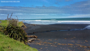 Black sand beach on the western coast of New Zealand's north island.
