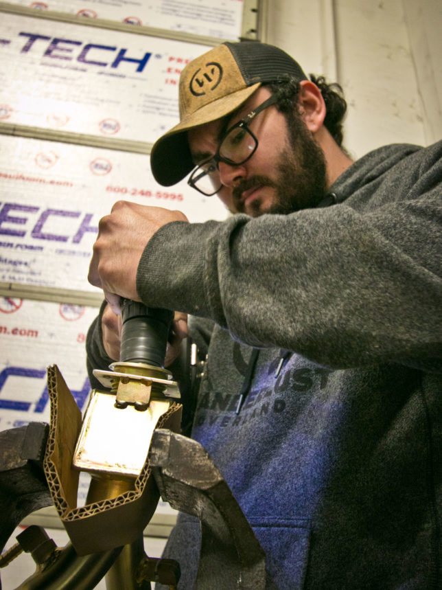 Enlarging hole for fuel filler