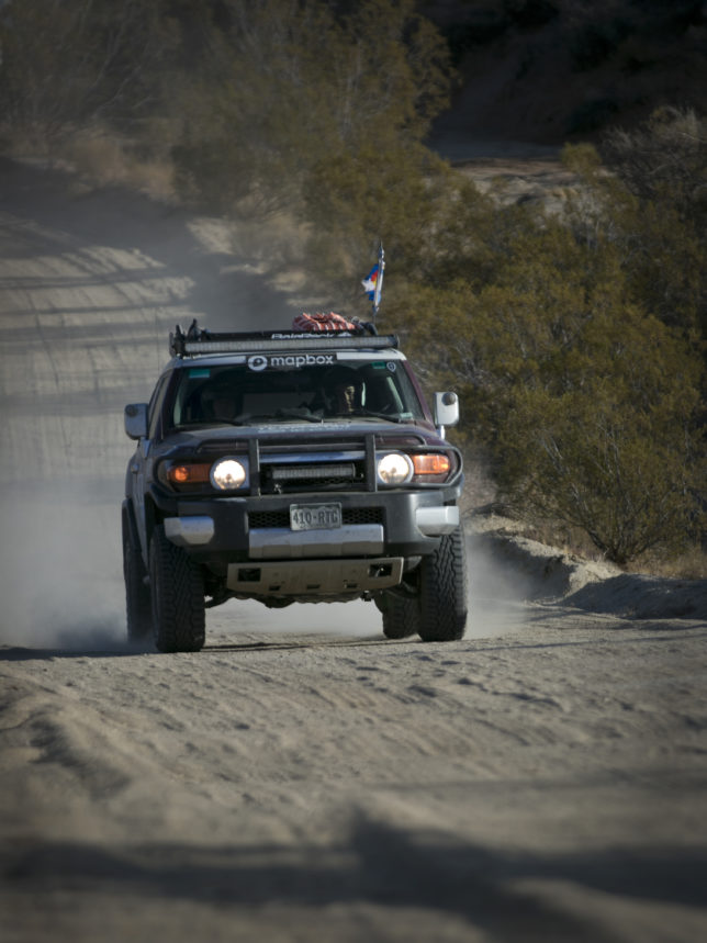 Kathy's customized 2008 FJ Cruiser barrels down this desert road. 