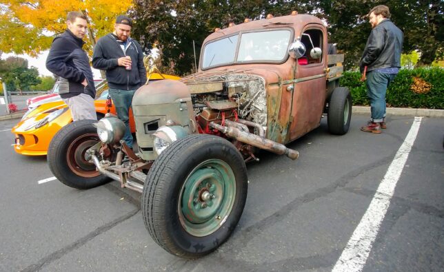 Checking out a vintage rat rod.