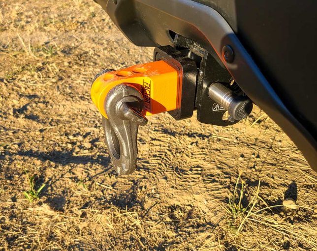 Factor 55 HitchLink 2.0 in orange with a WARN Epic Shackle for vehicle recovery.