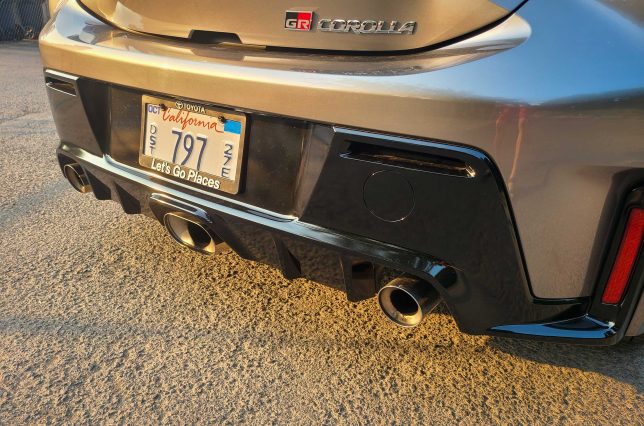 Toyota Corolla GR rear diffuser and three exhaust pipes.