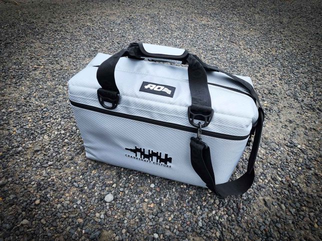 AO Coolers Carbon Series 36 Can Cooler with a custom Crankshaft  Culture logo embroidered on it.