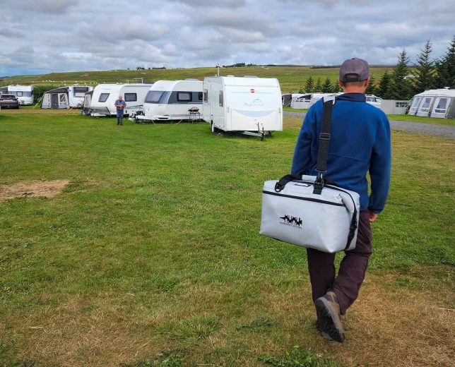 Carrying an AO Coolers Carbon Series 36 can cooler in Iceland.