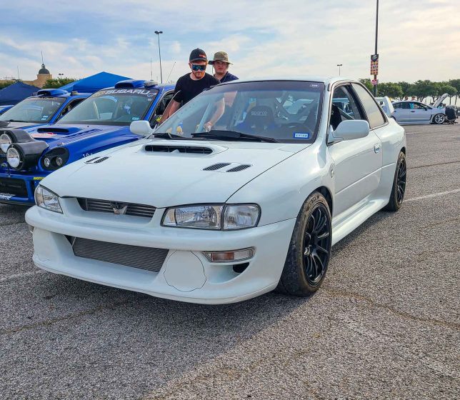 White two-door WRX at Subiefest Texas 2023.
