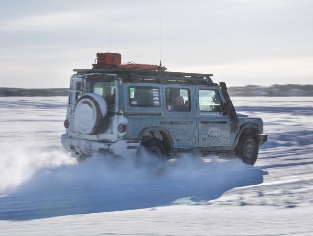 Andy Lilienthal on the ice racing course on Great Slave Lake piloting an INEOS Grenadier. 