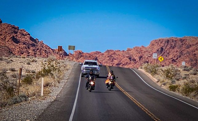 Riding two Honda Ruckus scooters across the US.