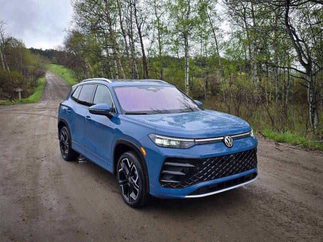 2025 Volkswagen Tiguan front three-quarters on dirt road
