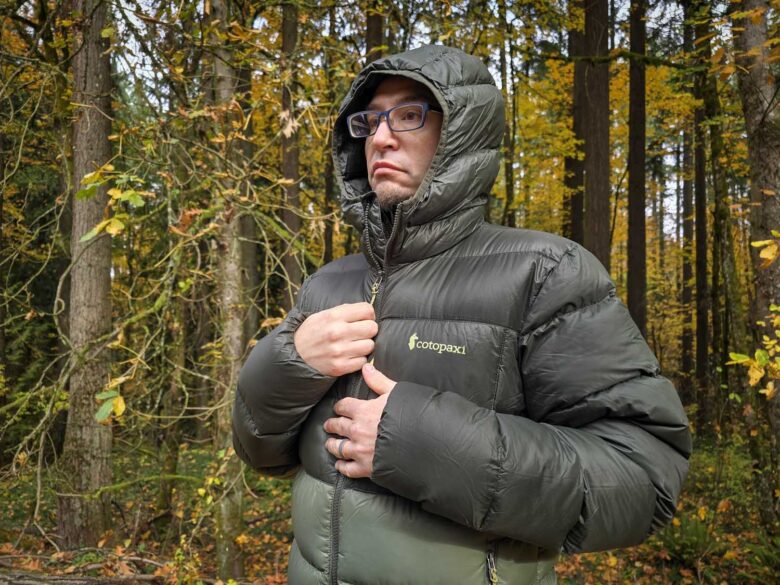 Man wearing Cotopaxi Fuego Max down jacket