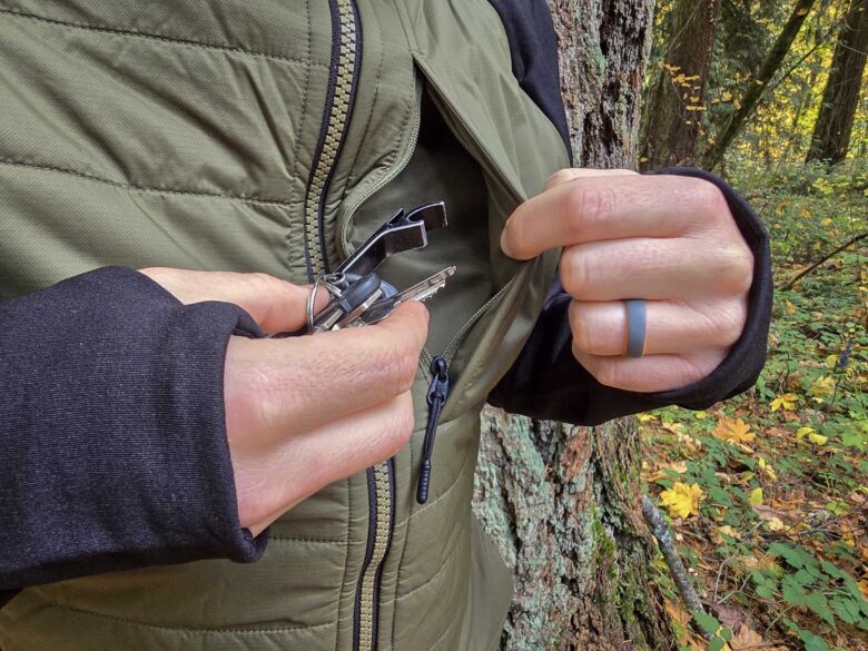 Man wearing Smartwool Smartloft Hybrid Jacket exterior chest pocket detail