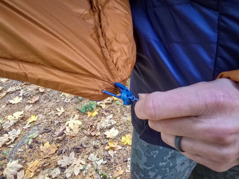 Cotopaxi Fuego Max down jacket bottom pull cord