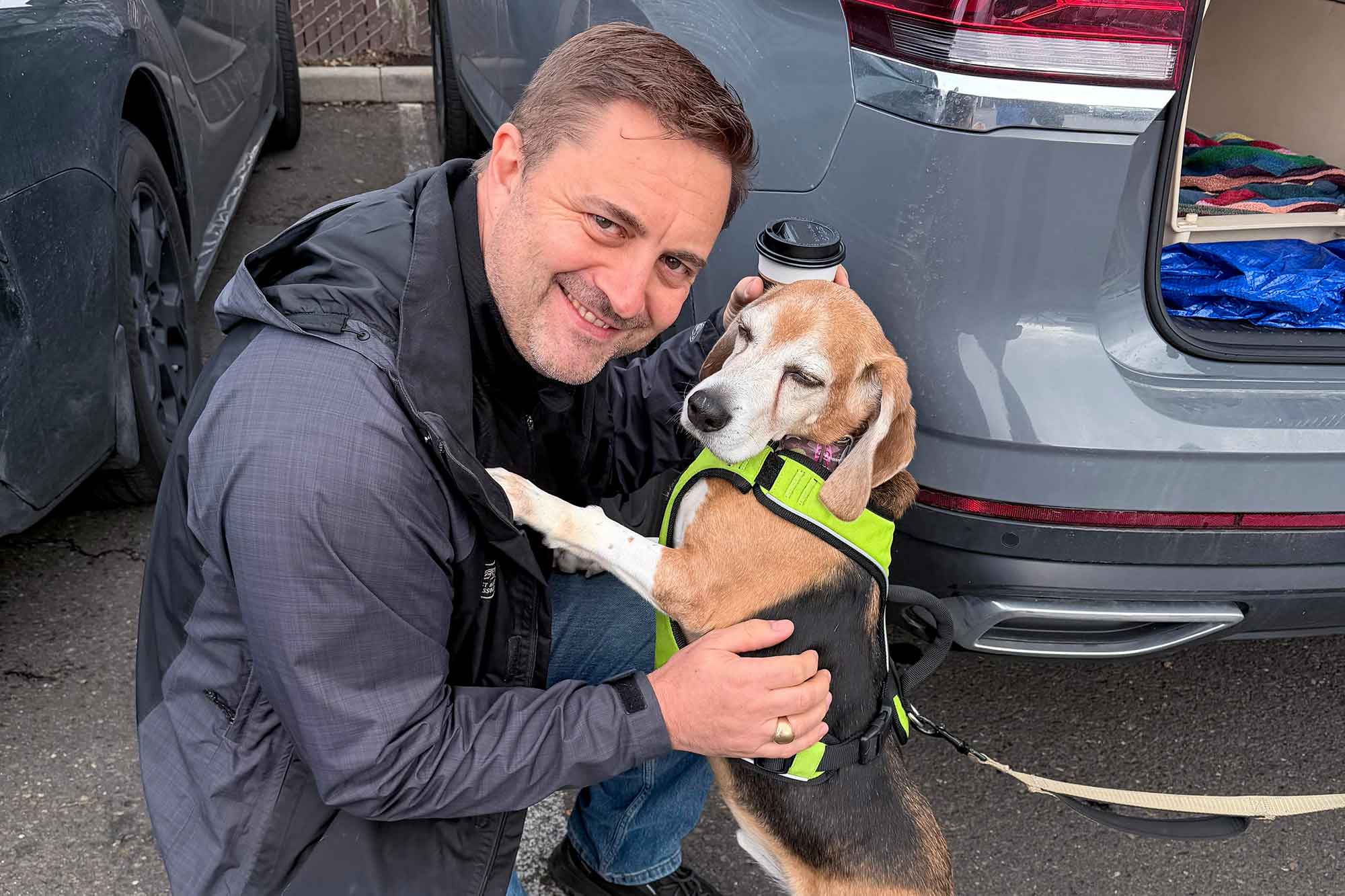 Operation Frodo volunteer, Aaron Hansen, and a rescue beagle on Operation Frodo.
