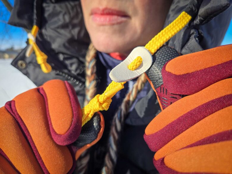 Fjällräven Expedition Down Lite Jackets have bright yellow strings and white leather drawstring systems