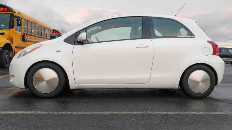 Toyota Yaris on Moon hubcaps