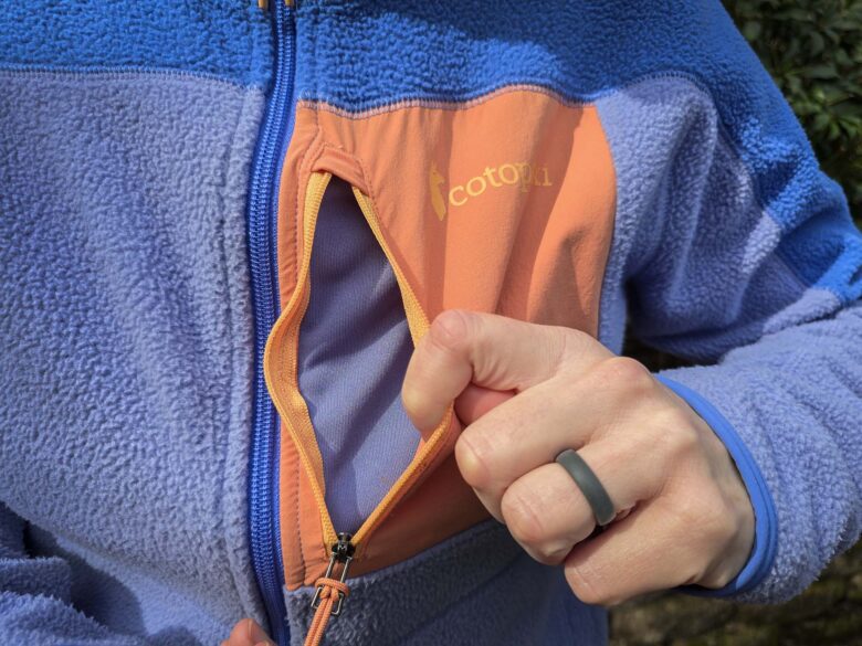 Cotopaxi Abrazo Fleece Full-Zip Jacket chest pocket opened