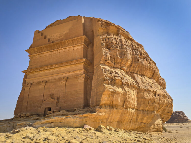 Hegra unfinished tomb cut into large round rock formation