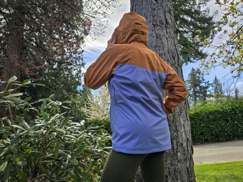 Cotopaxi Impermeo 3L Hooded Shell Jacket zipped up, back side with hood up