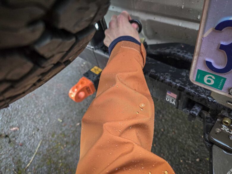 Cotopaxi Impermeo 3L Hooded Shell Jacket and water beading on sleeve