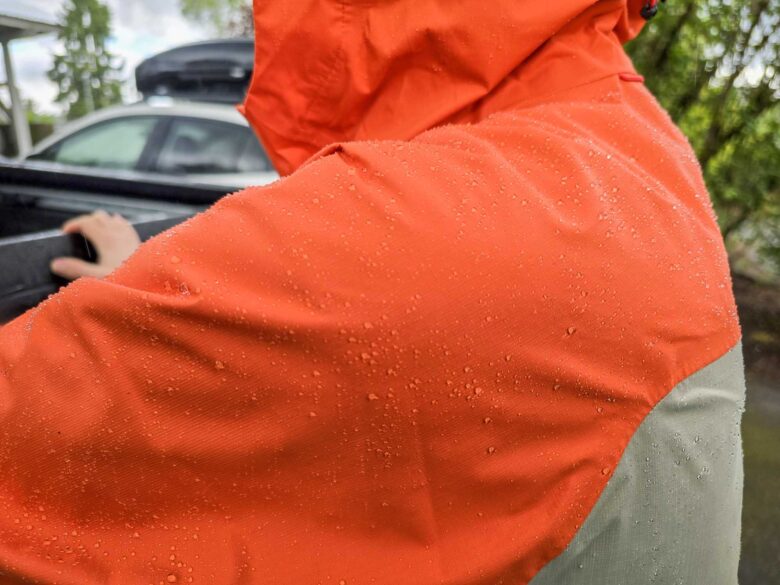 Mountain Hardwear Threshold Jacket men's with water beading on top of shoulders