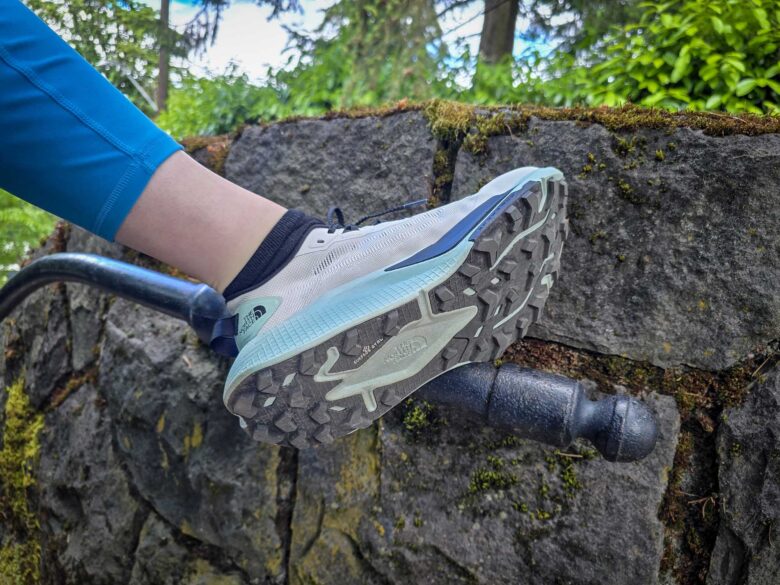 The North Face Altamesa 500 V2 shoes showing sole while sitting on handrail