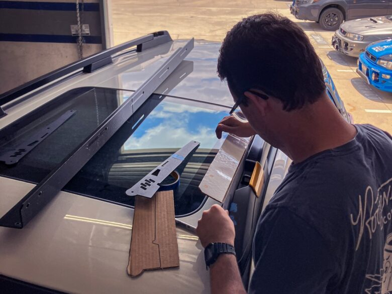 ZenSpeed student working on Subaru Forester Wilderness roof rack at Rally Innovations in Anaheim, CA.