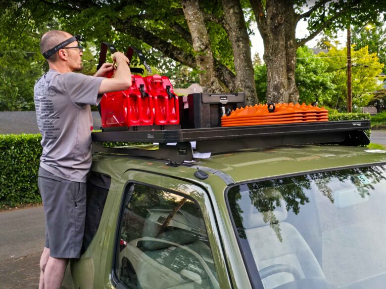 Andy installing a host of Front Runner Dometic Slimline II roof rack accessories.